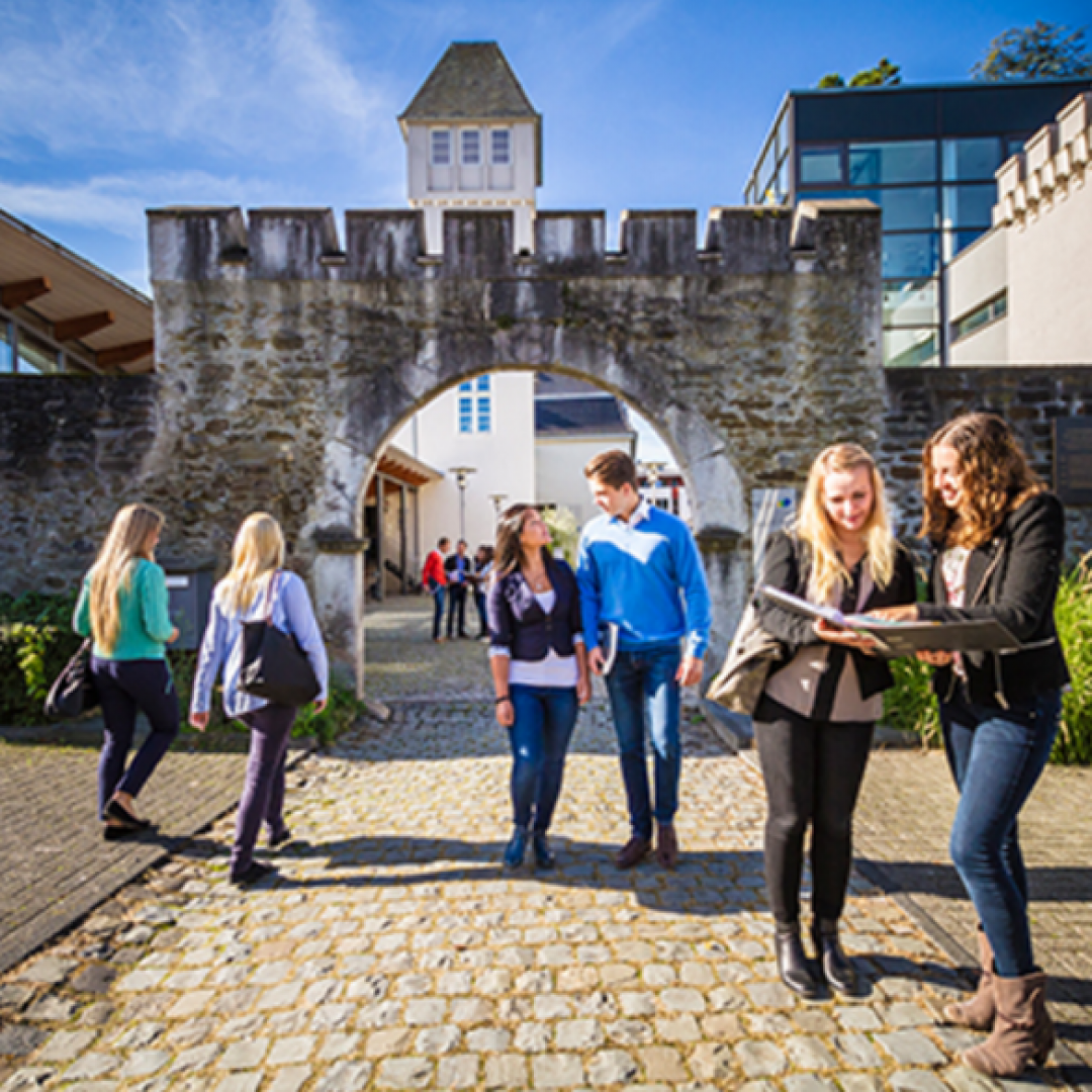student walking at iubh school of business and management, jerman